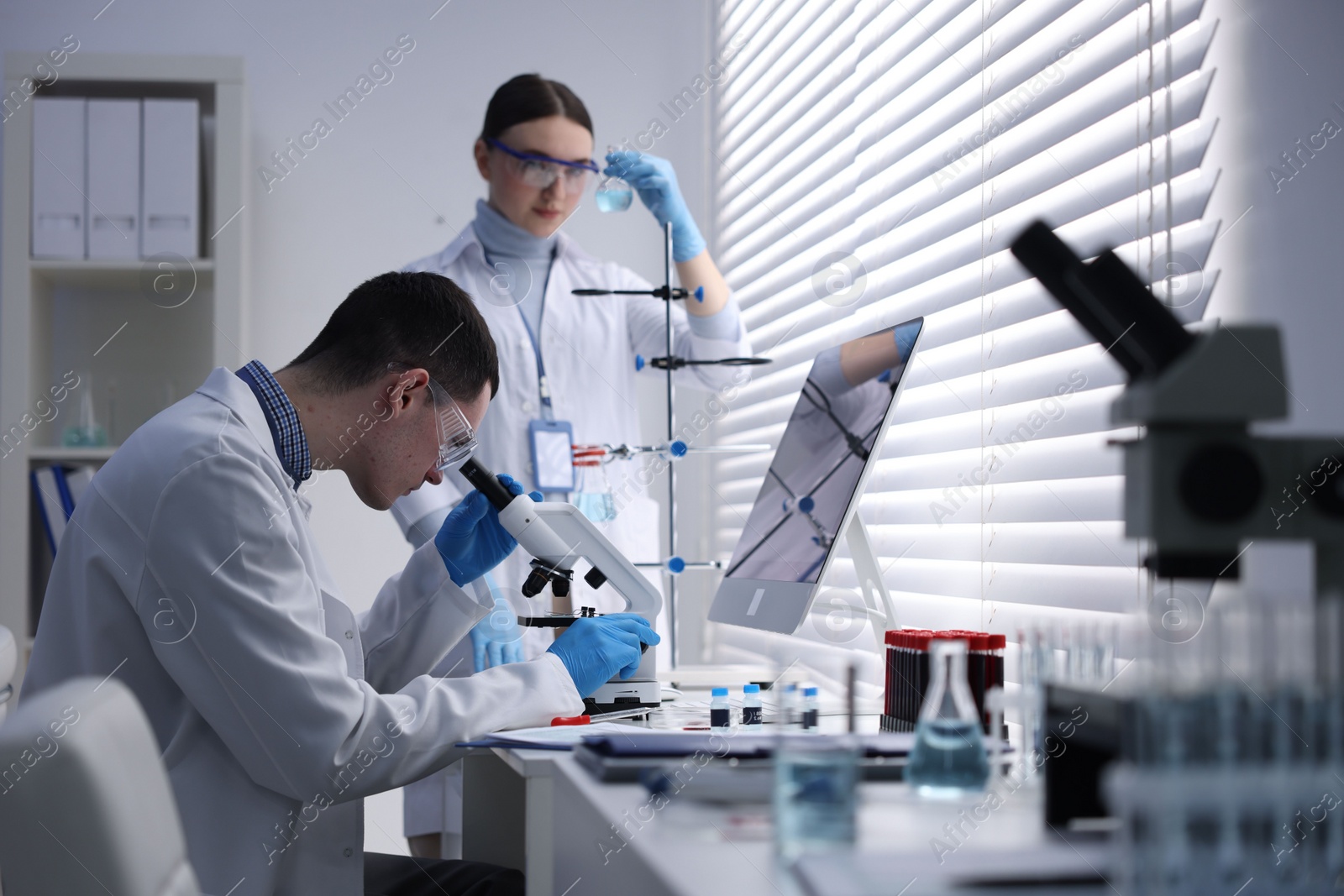 Photo of Scientists working with samples in laboratory. Medical research