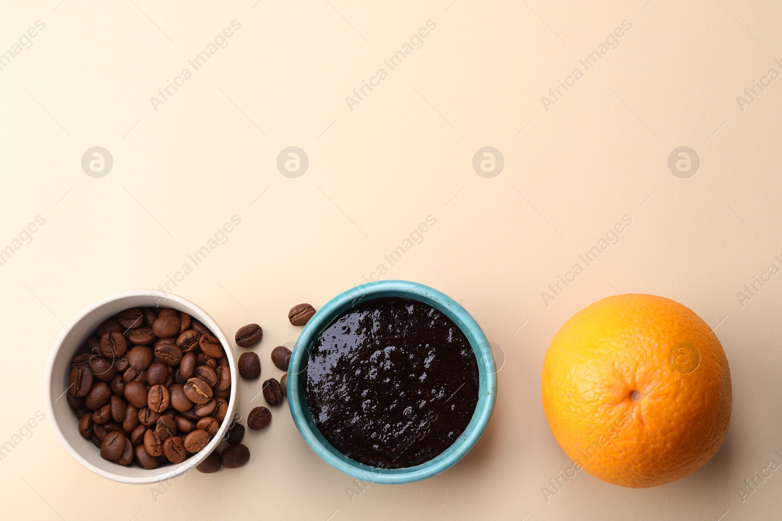 Photo of Flat lay composition with natural body scrub and fresh ingredients on beige background, space for text. Anti cellulite treatment