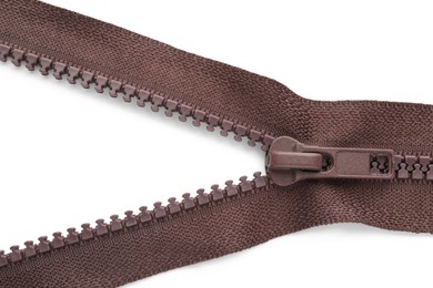 Photo of Brown zipper on white background, top view