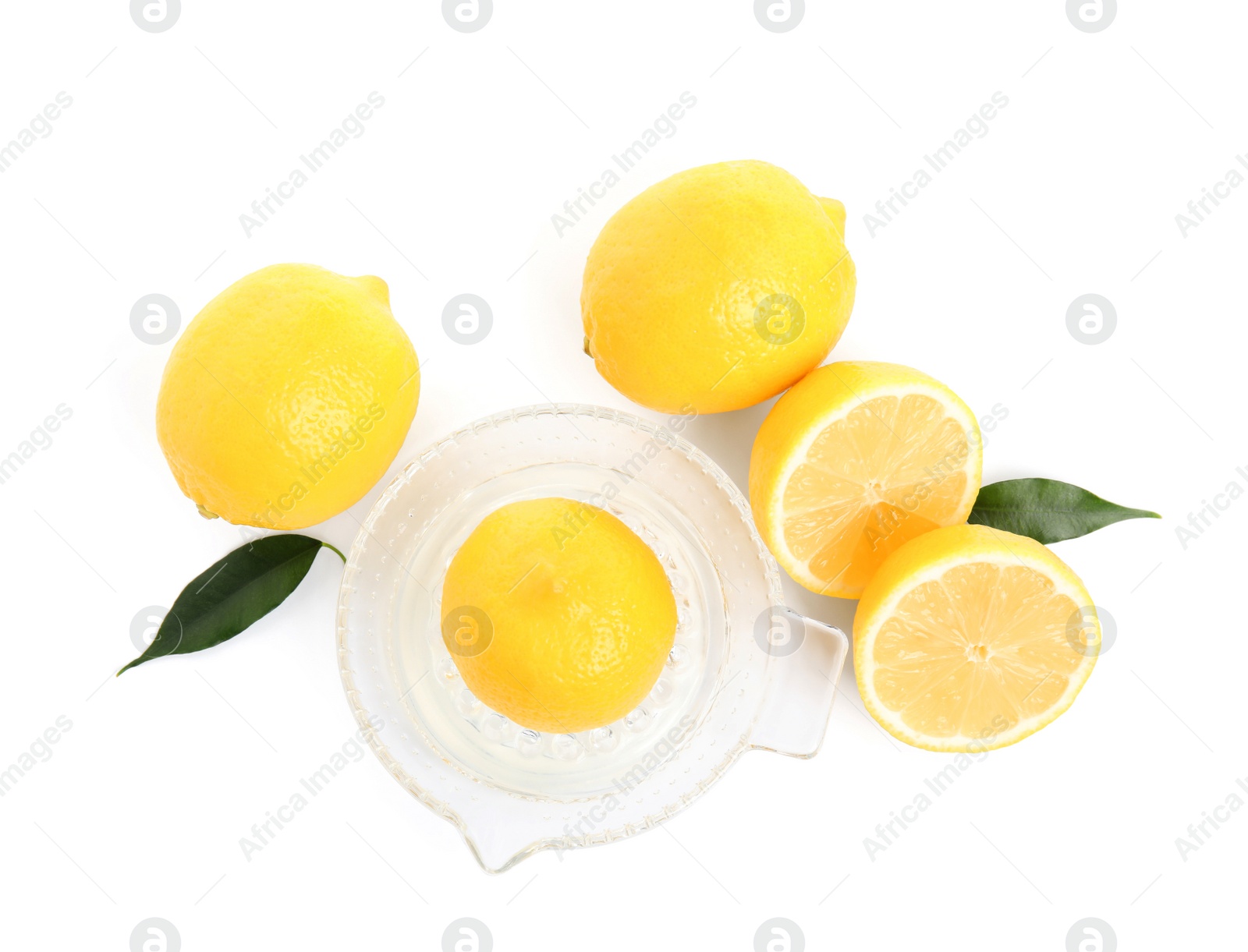Photo of Plastic juicer and fresh lemons on white background, top view
