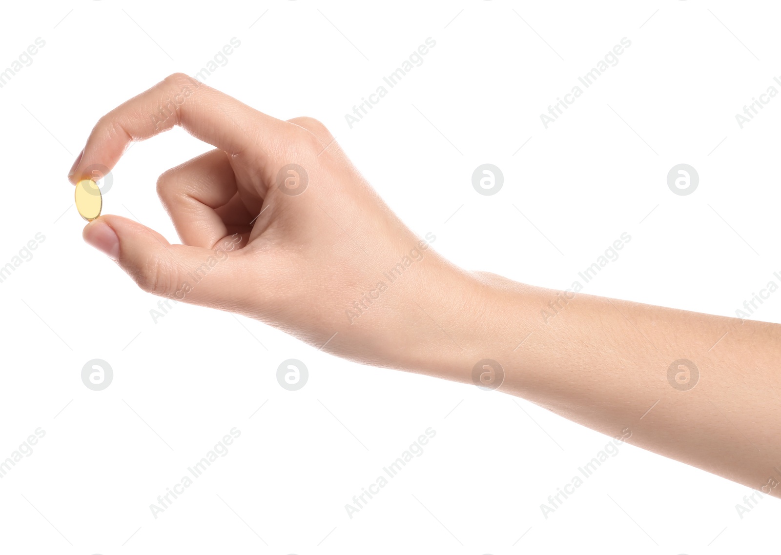 Photo of Woman holding color pill on white background, closeup