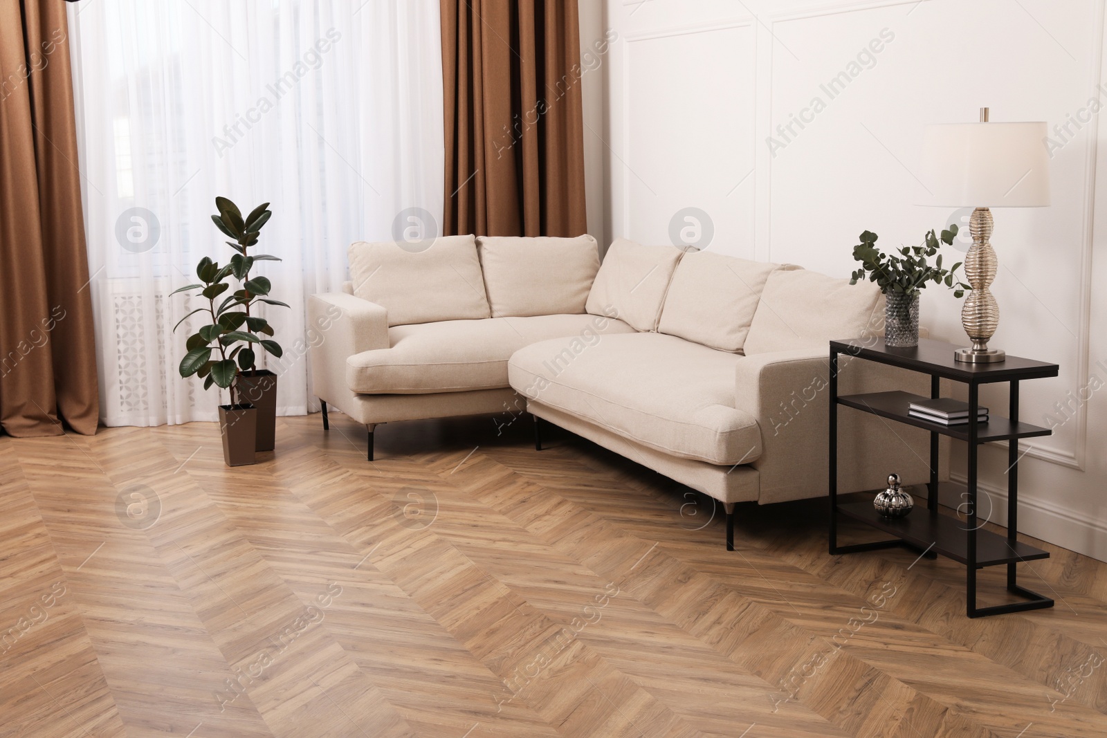 Photo of Modern living room with parquet flooring and stylish furniture