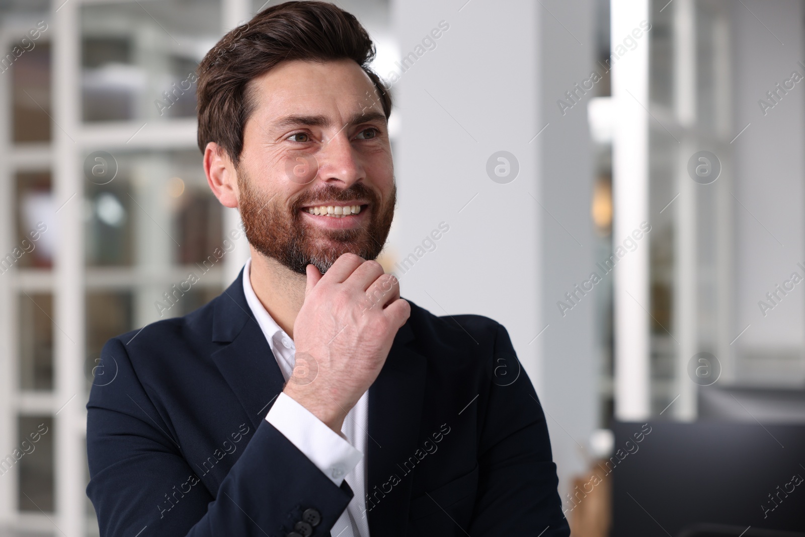 Photo of Portrait of smiling man in office, space for text. Lawyer, businessman, accountant or manager