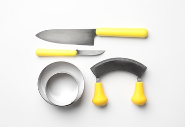 Photo of Set of modern cooking utensils on white background, top view