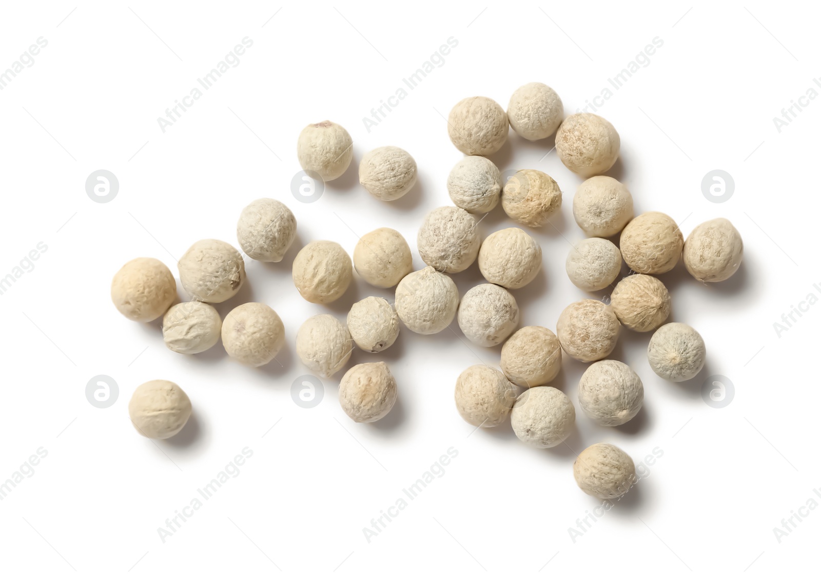 Photo of Aromatic spice. Pile of peppers isolated on white, top view