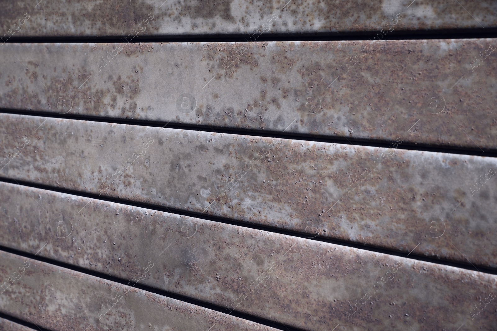 Photo of Texture of metal surface with rust as background, closeup view