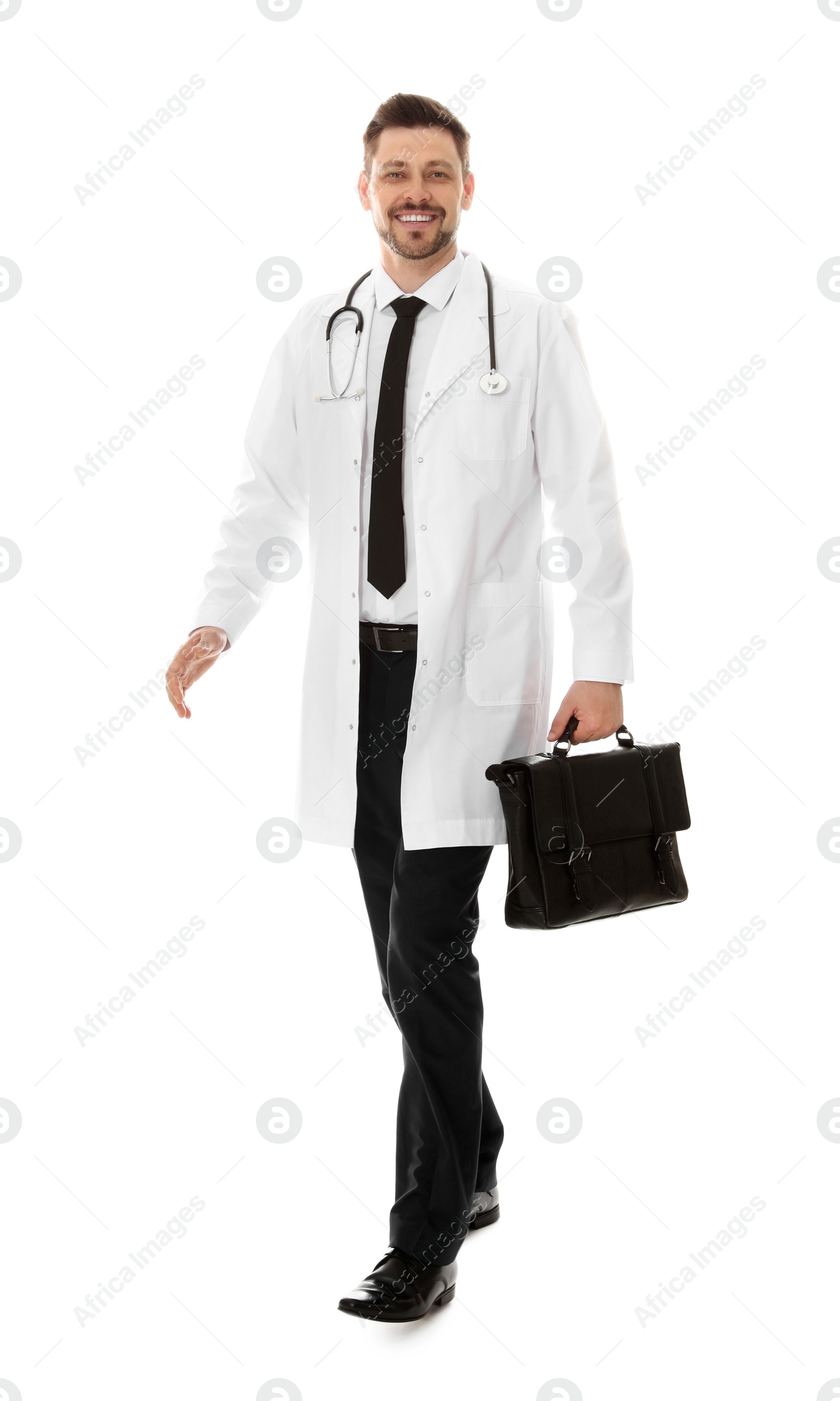 Photo of Full length portrait of male doctor with briefcase isolated on white. Medical staff