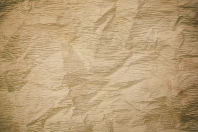 Image of Crumpled old paper as background. Texture of parchment