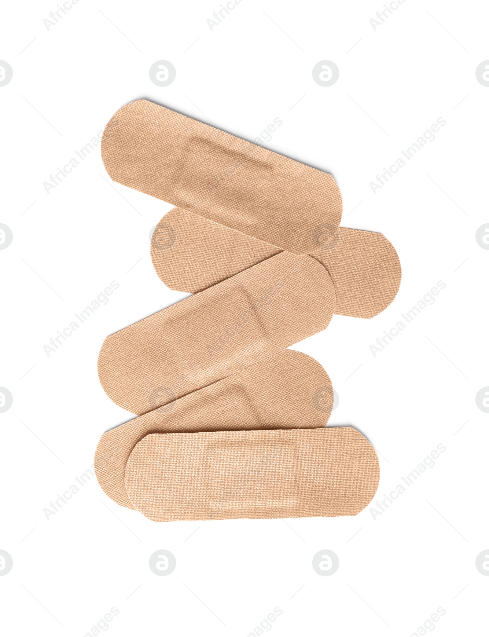 Medical sticking plasters isolated on white. First aid item Photo of Medical sticking plasters isolated on white. First aid item