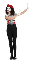 Photo of Funny mime with beret posing on white background