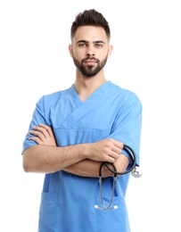 Photo of Young male doctor in uniform isolated on white