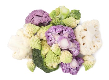 Photo of Heap of various cauliflower cabbages on white background, top view