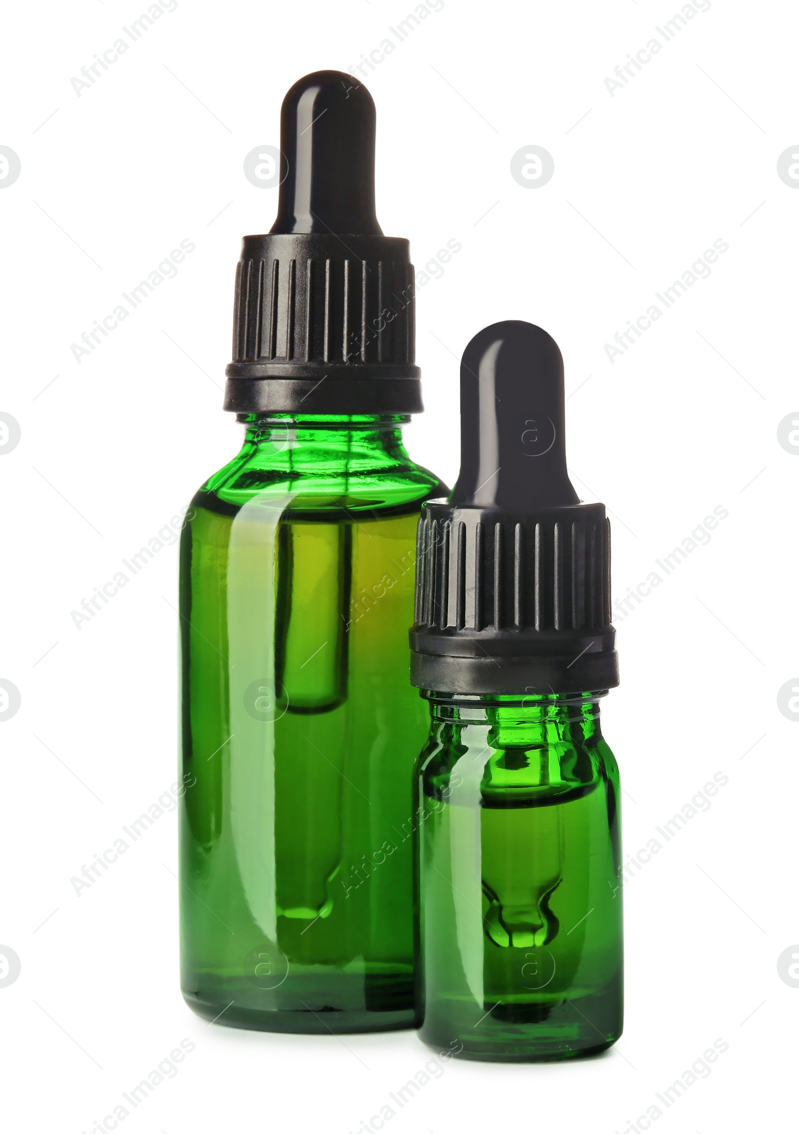 Photo of Cosmetic bottles of essential oils on white background