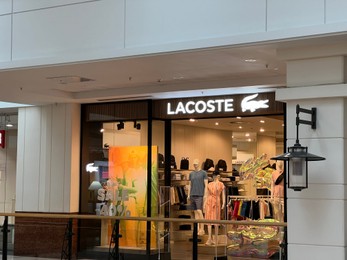 Photo of Poland, Warsaw - July 12, 2022: Official Lacoste store in shopping mall