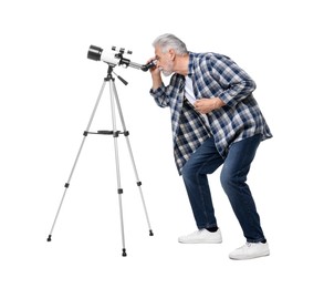 Senior astronomer looking at stars through telescope on white background