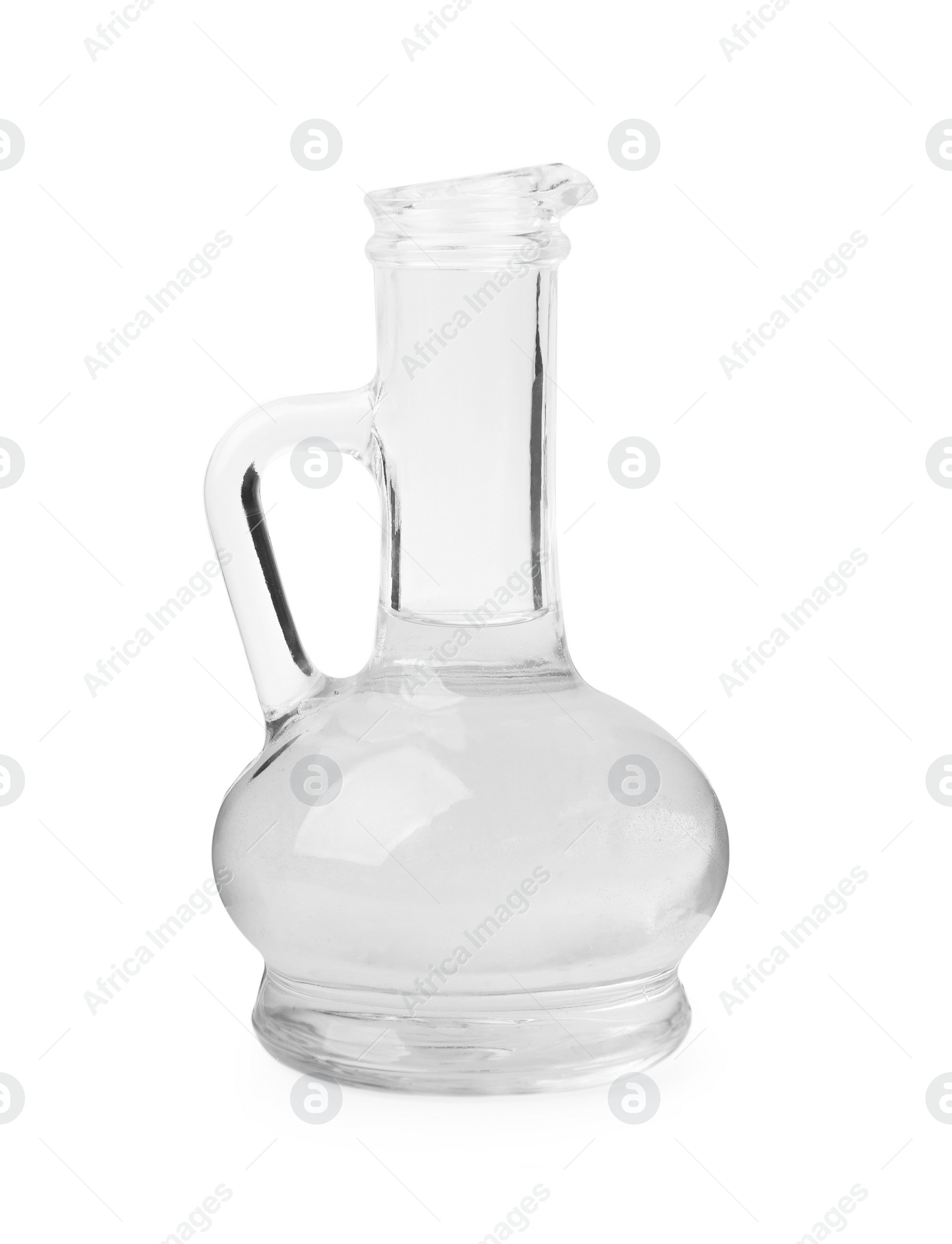 Photo of Vinegar in glass jar isolated on white