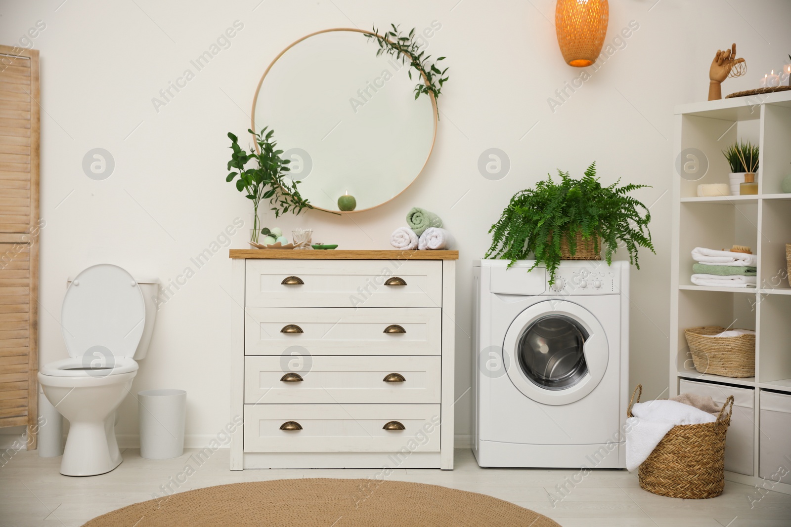 Photo of Elegant interior of modern bathroom with green plants