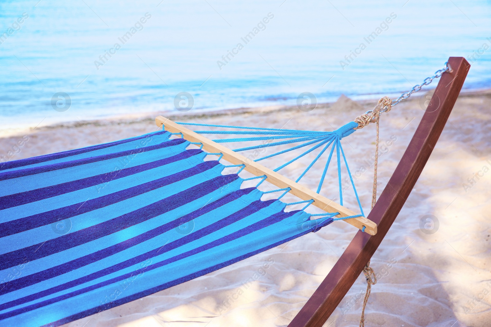 Photo of Empty hammock at seaside. Time to relax