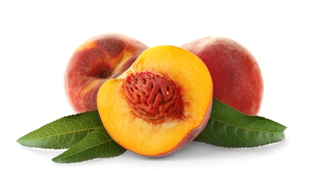 Photo of Fresh sweet peaches on white background