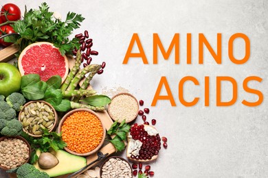 Image of Fresh vegetables, fruits and seeds on light grey table, flat lay. Sources of essential amino acids 