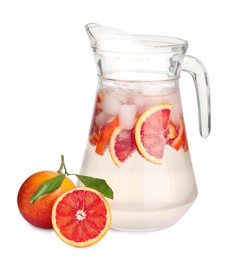Photo of Delicious refreshing drink with sicilian orange and ice cubes in jug isolated on white