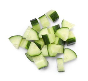 Photo of Pile of fresh cut cucumber isolated on white, top view