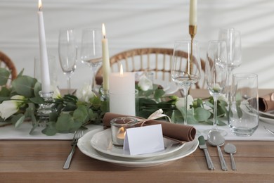 Festive table setting with beautiful tableware and decor indoors