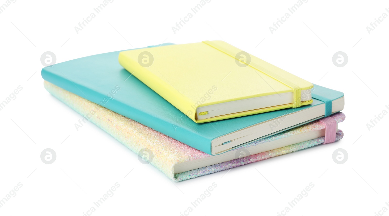 Photo of Stack of different colorful hardcover planners on white background