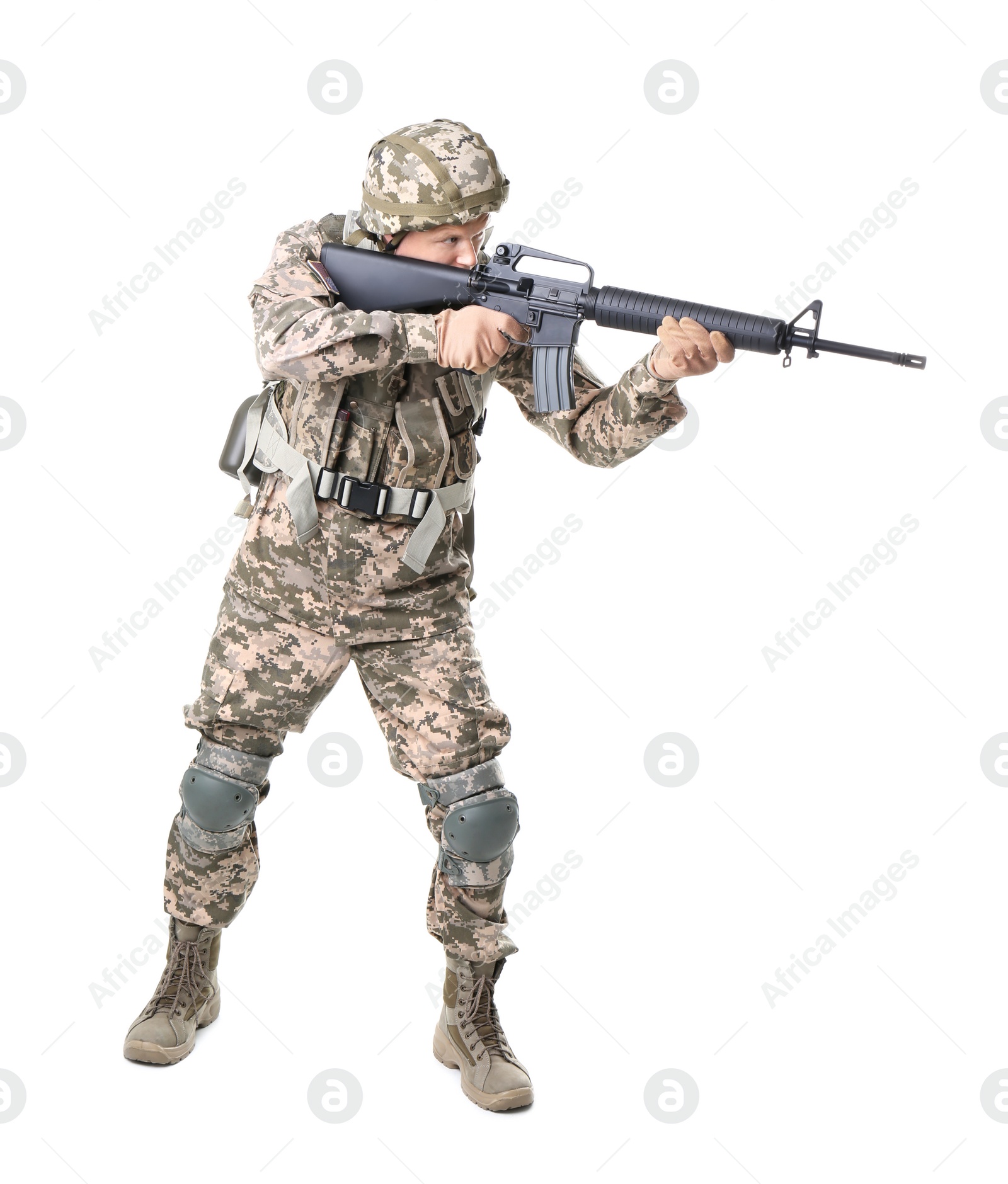 Photo of Male soldier with machine gun on white background. Military service