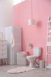 Photo of Toilet bowl in modern bathroom interior