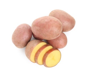 Photo of Whole and cut fresh potatoes on white background