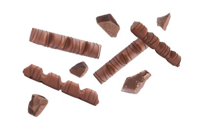 Image of Tasty chocolate bars falling on white background