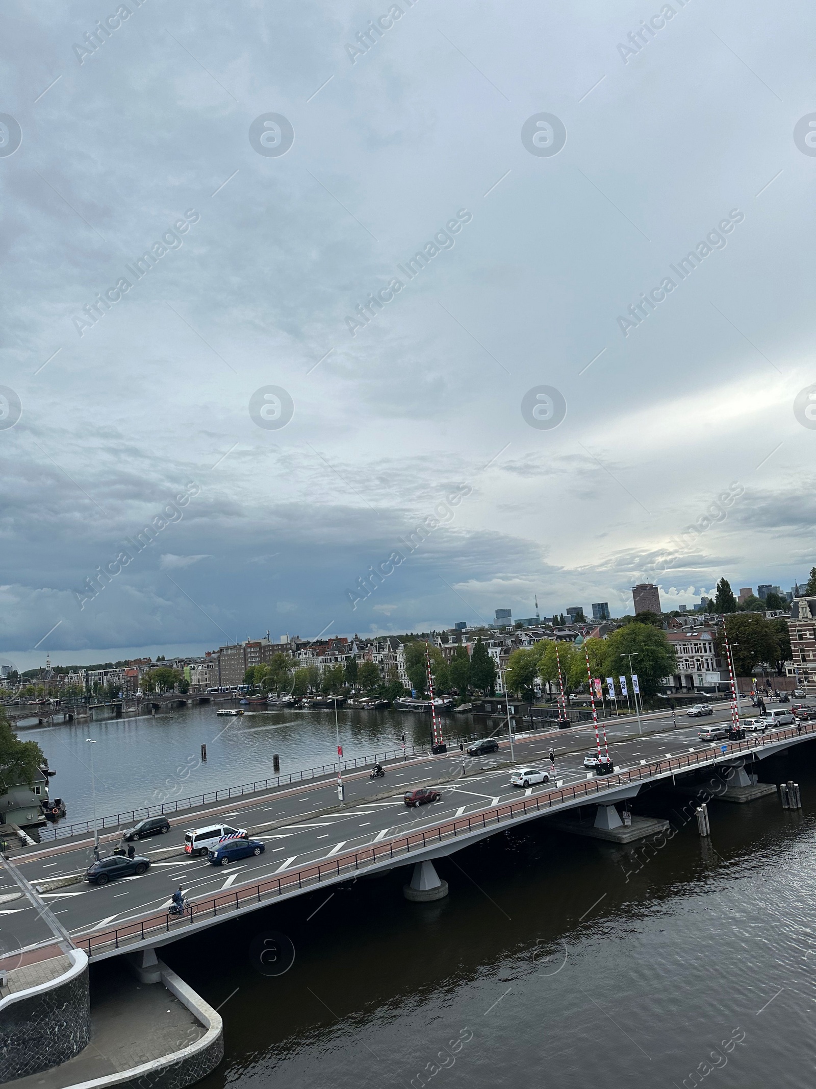 Photo of Amterdam, Netherlands - September 22, 2023: Beautiful view on city under cloudy sky