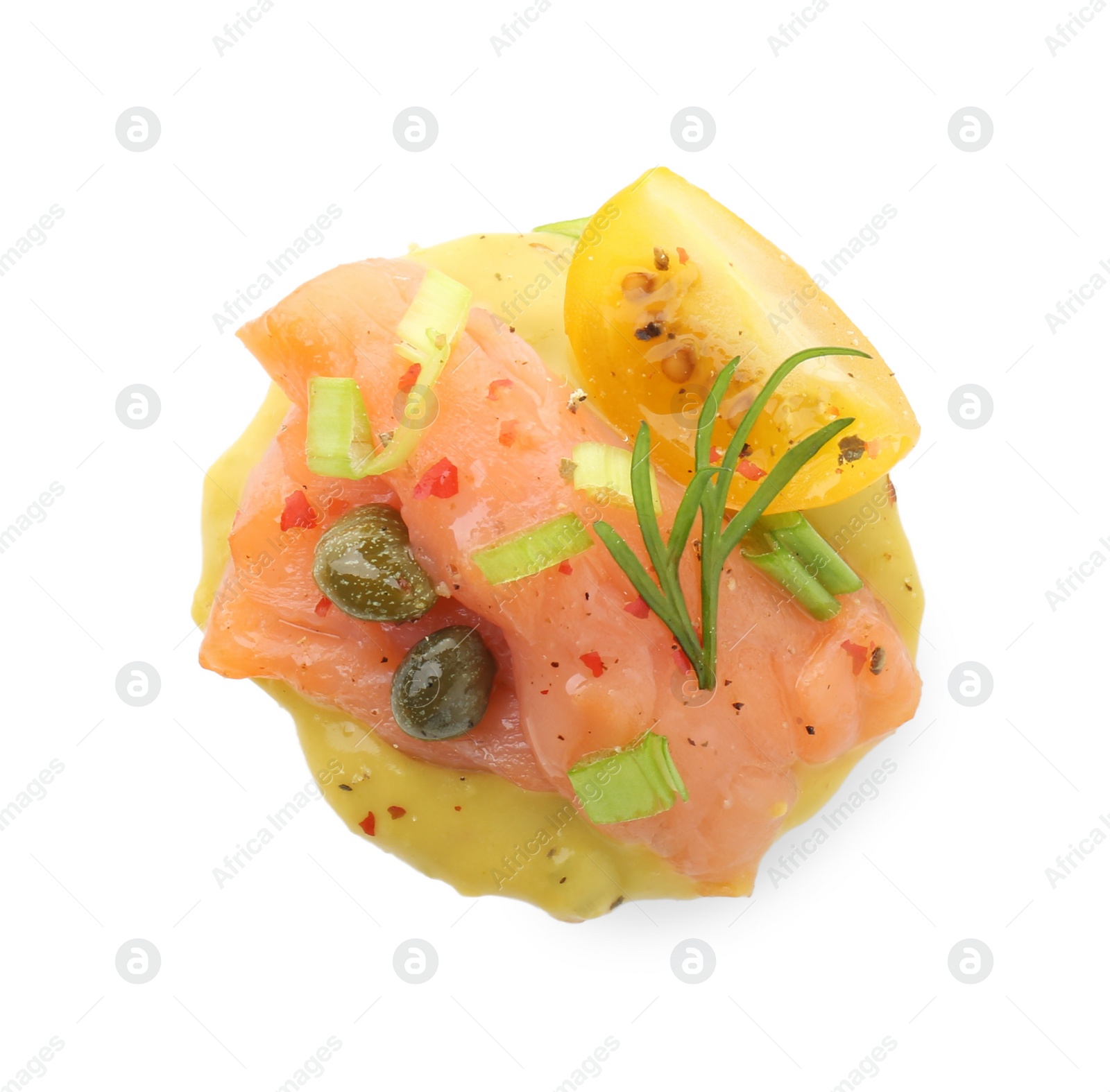 Photo of Tasty canape with salmon, tomatoes, capers and herbs isolated on white, top view