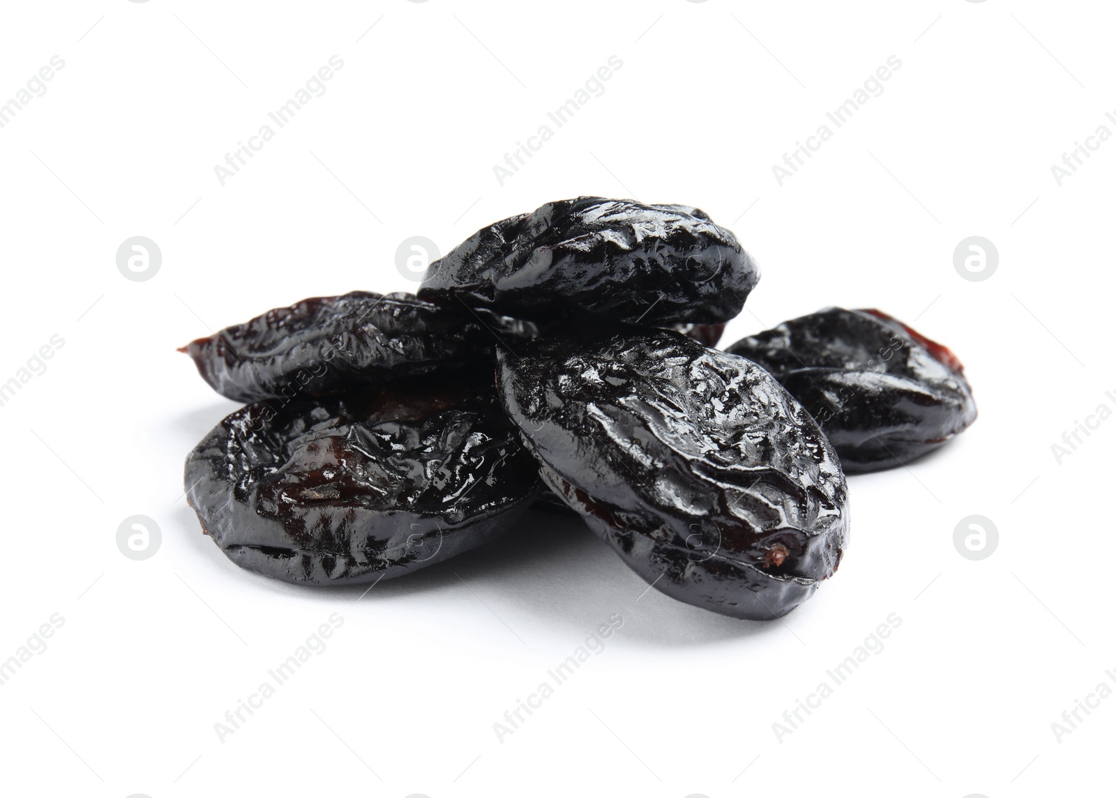 Photo of Heap of tasty prunes on white background. Dried fruit as healthy snack