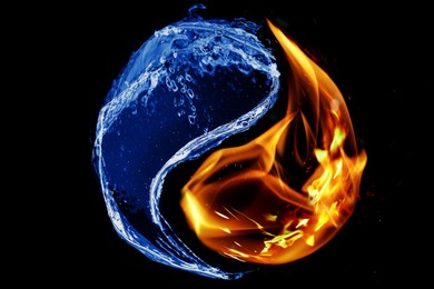 Image of Fire flames and water splashes resembling Yin Yang symbol on black background. Feng Shui philosophy