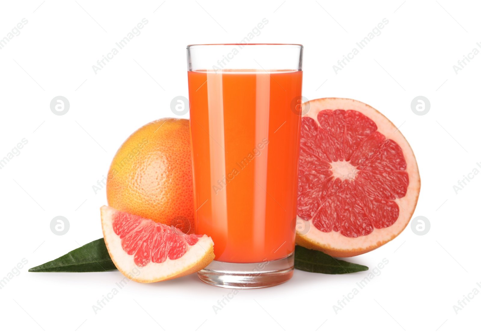 Photo of Tasty grapefruit juice in glass, fresh fruits and green leaves isolated on white