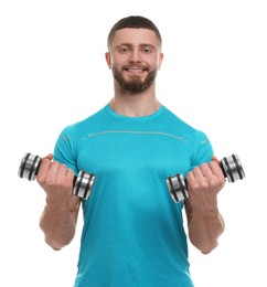 Handsome man exercising with dumbbells on white background