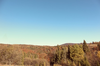 Picturesque landscape with blue sky over mountains