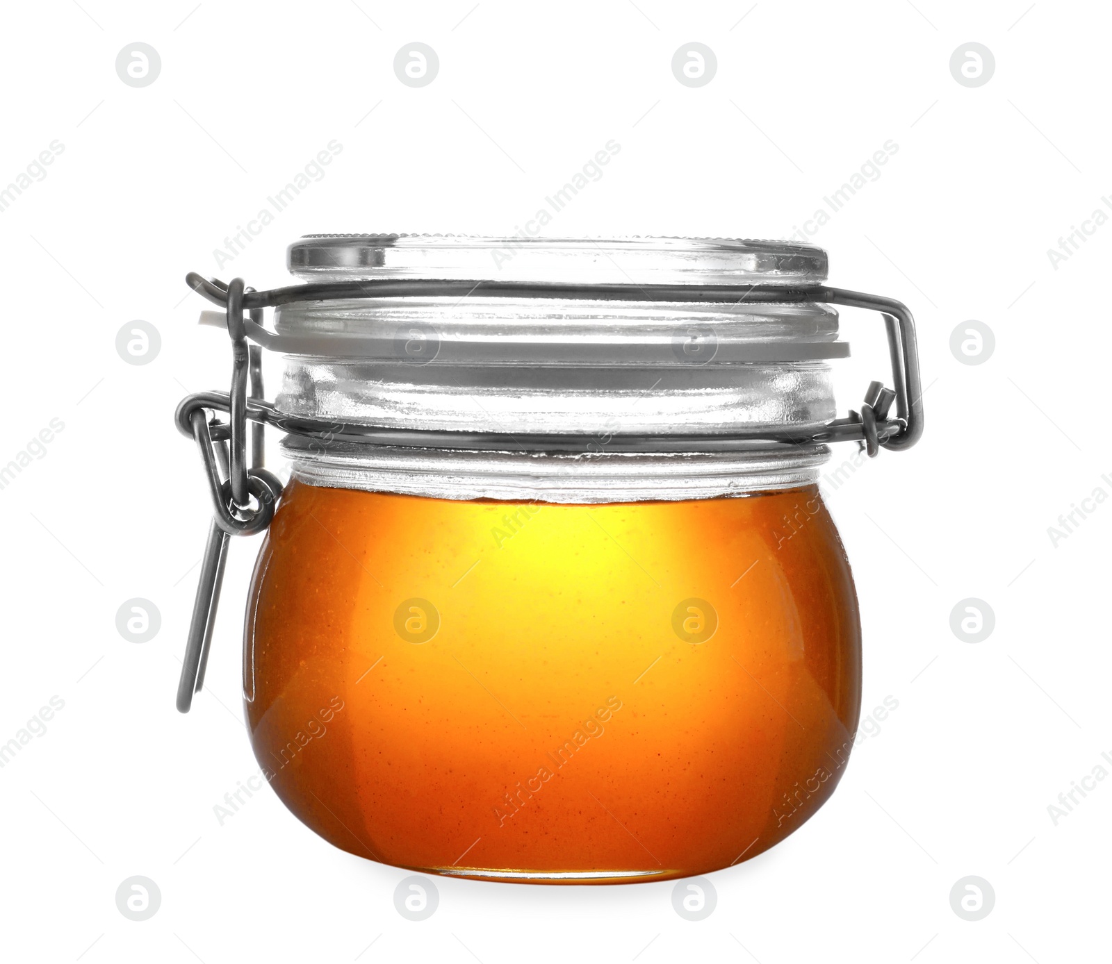 Photo of Jar with organic honey isolated on white