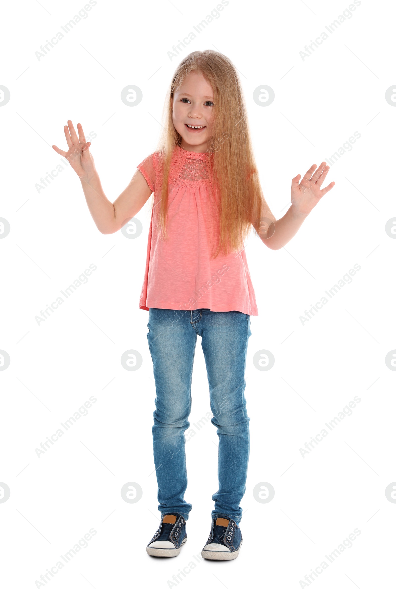 Photo of Full length portrait of cute little girl in casual outfit on white background