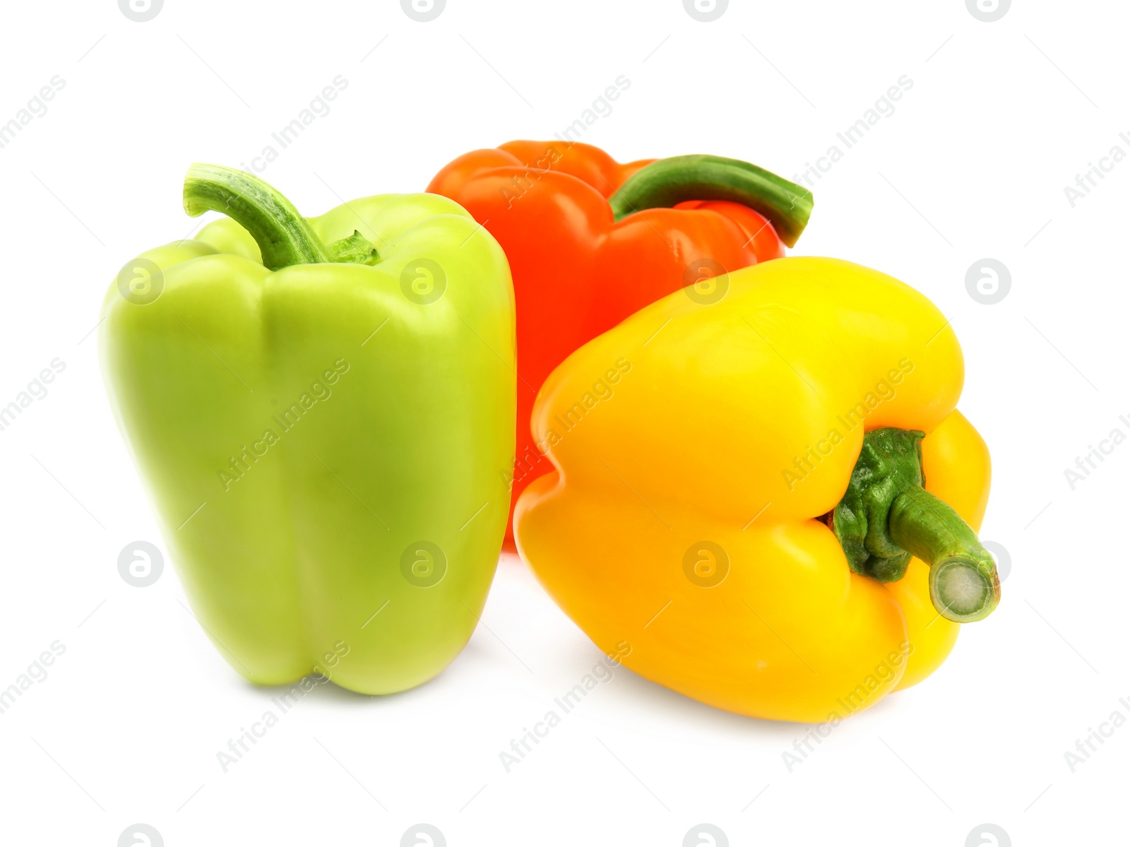 Photo of Fresh ripe bell peppers on white background