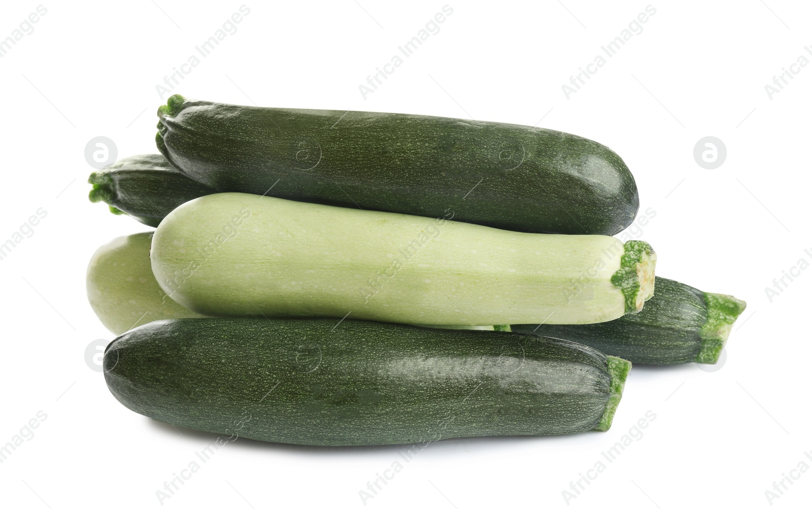 Photo of Fresh ripe green zucchinis isolated on white