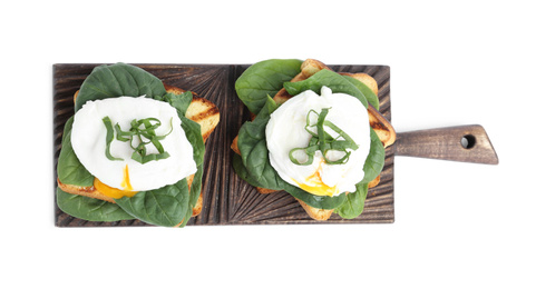 Delicious poached egg sandwiches isolated on white, top view