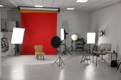 Interior of modern photo studio with professional equipment