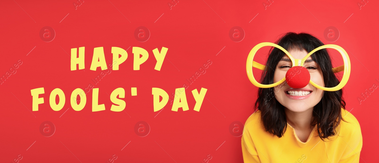 Image of Funny woman with large glasses and clown nose on red background, banner design. Happy fool's day