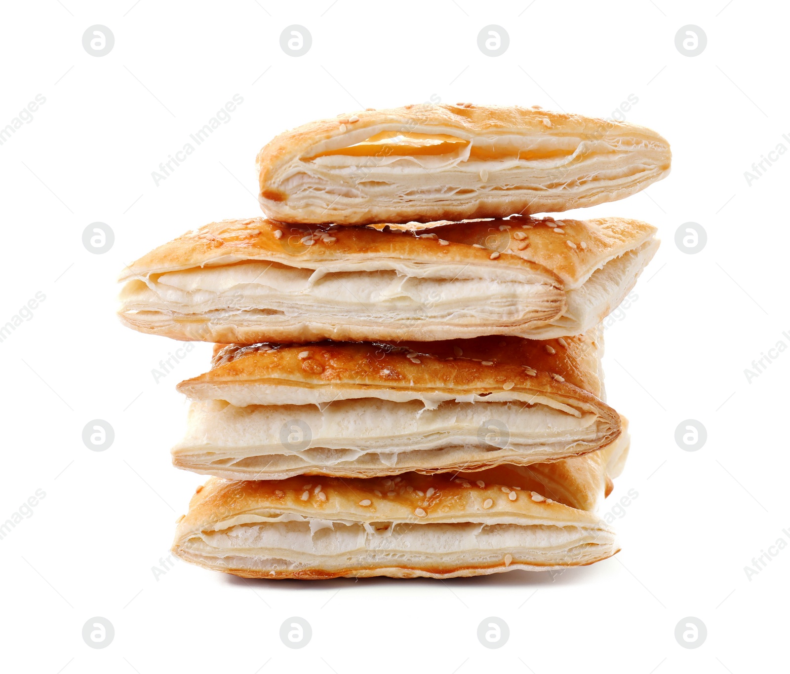 Photo of Stack of delicious fresh puff pastries isolated on white