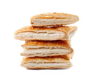 Photo of Stack of delicious fresh puff pastries isolated on white