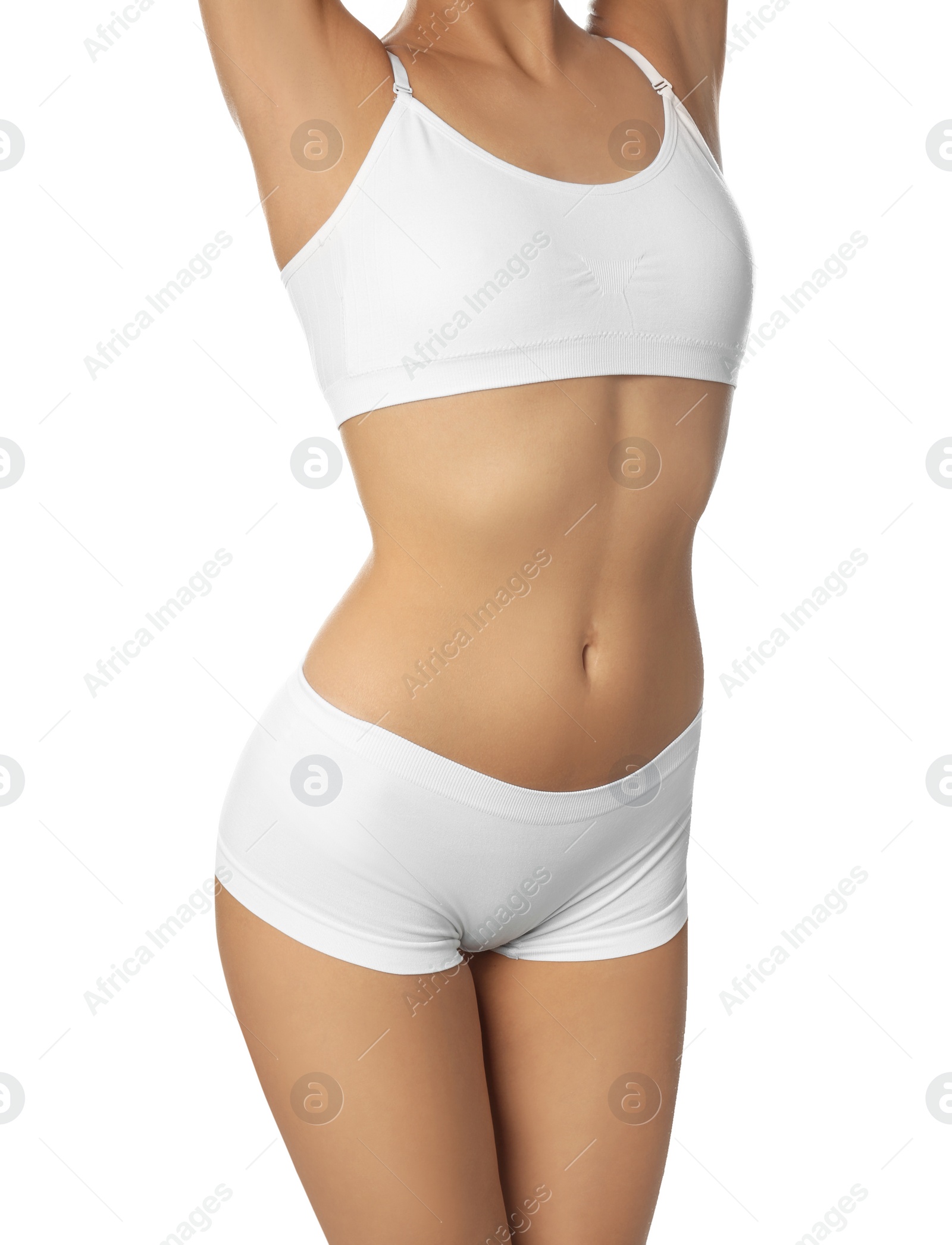 Photo of Young woman with slim body isolated on white, closeup. Plastic surgery concept