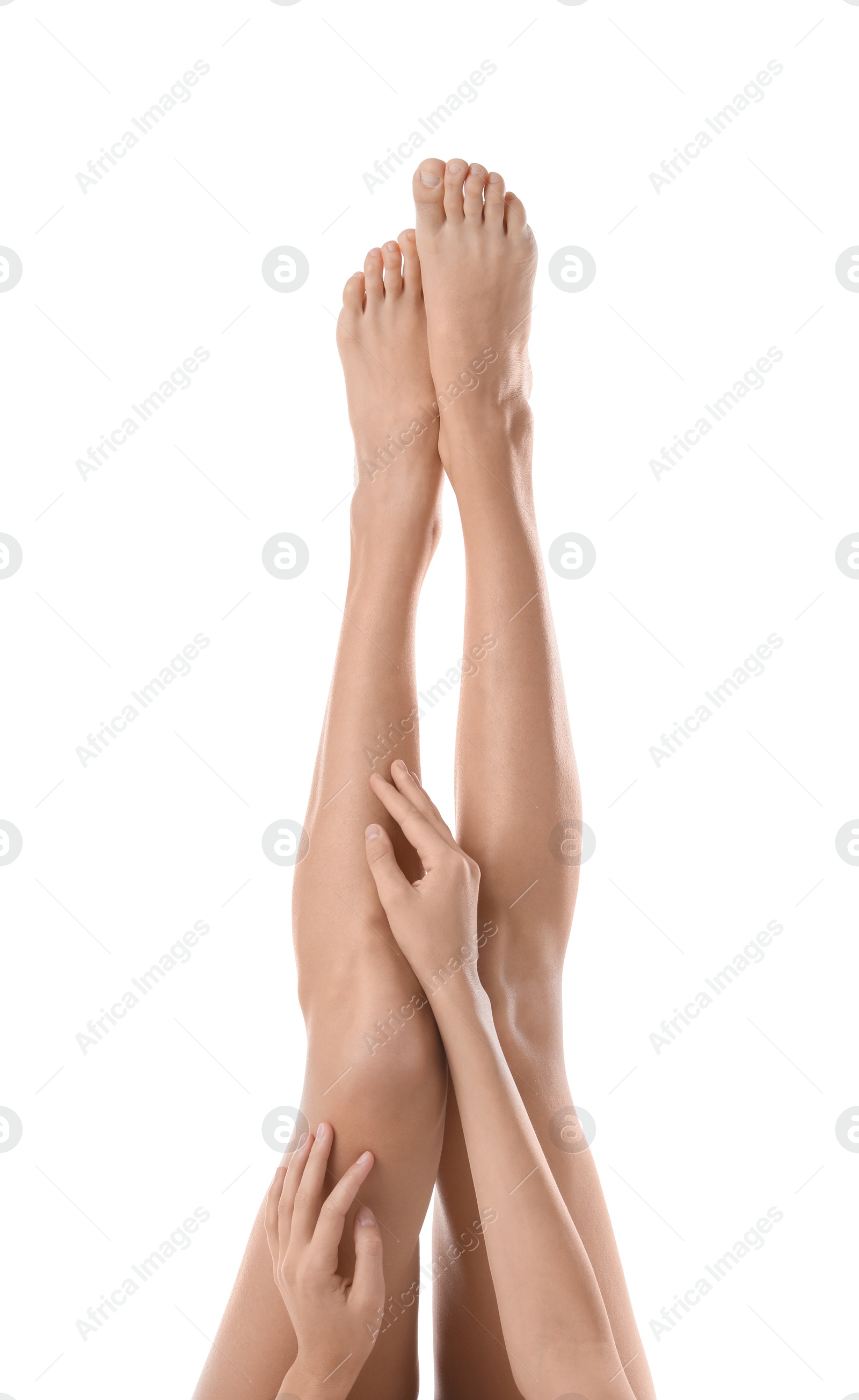 Photo of Young woman with beautiful long legs on white background, closeup